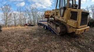 Fixing a driveway with a trackloader Cat 943