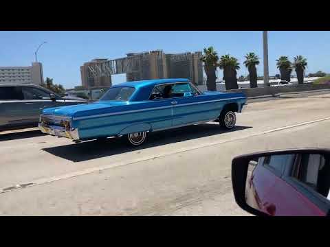1964 impala lowrider on the freeway in San Diego
