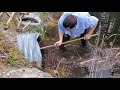 Removing Large Blockage, Flooding Over Road, Caused By Broken Beaver Proof Intake Structure