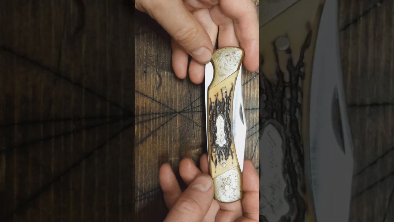 Старый складной карманный нож Schrade Uncle Henry с фиксатором лезвия — изношенное лезвие заточено.