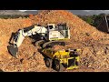 Liebherr RC 9800 excavator with Cat 793 Dump truck- First Dig Mining