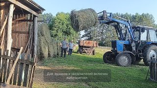 видео: привезли рулоны сена и укладка в пирамиду )) картинка: привезли рулоны сена и укладка в пирамиду ))