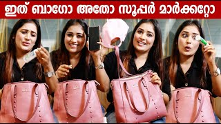 "WHATS IN MY BAG" with ANUMOL | GINGER MEDIA