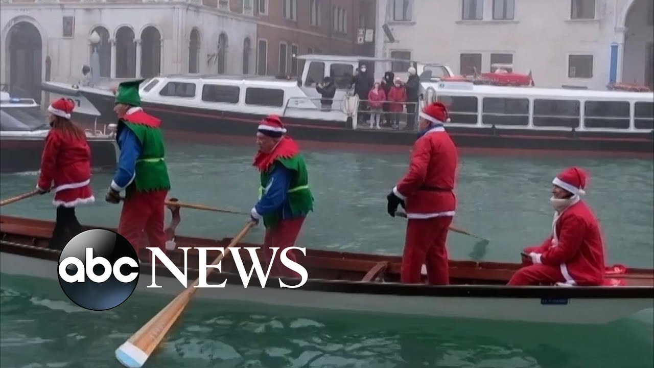 Santas swap sleighs for gondolas in Venice Christmas regatta l ABC News