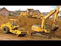 Excavator Dump Trucks Motor Grader Compactor Busy  Working On Toll Road Construction