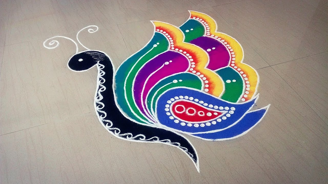 Beautiful Butterfly color Rangoli Design Butterfly Kolam Design