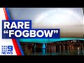 Rare weather phenomenon known as a 'fogbow' appears in Queensland sky | 9 News Australia