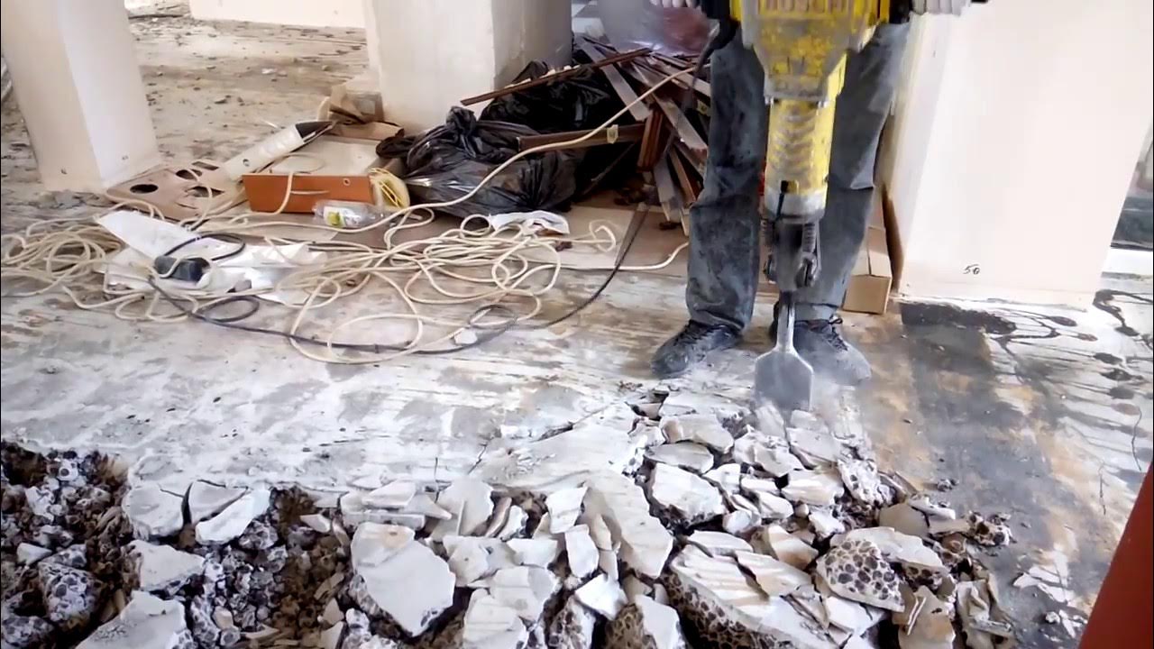 демонтаж бетона отбойными молотками. демонтаж бетонного основания. демонтаж бетонных полов. стяжки. демонтаж бетона б40.