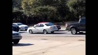 Wrong Way Car Stuck Going Backwards in Traffic