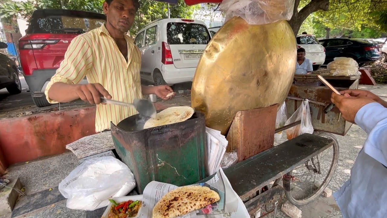 Asian guy use Crafted Bicycle sells Flat Bread 