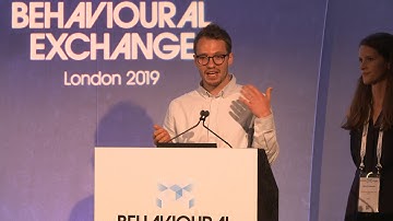 The best of behavioural science in UK Government: moving from micro to macro