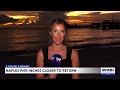 Naples beachgoers watch beloved pier slowly return after Hurricane Ian