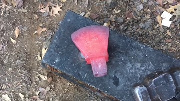 Blacksmithing/toolmaking forging a cutoff hardy