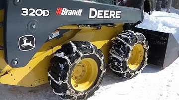 TIRE CHAINS ON  320D SKID STEER, WHAT WE THINK