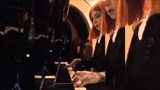 Kat Von D playing the piano