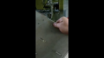 Lever arch file four riveting machine