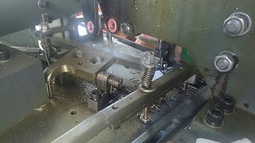 full automatic high speed hangtag punching and string knotting machine的副本