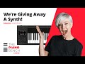 Were giving away an expressivee synthesizer   the piano bench