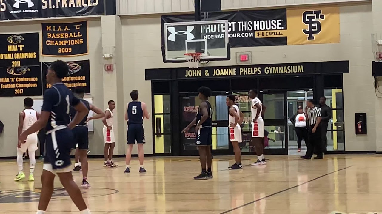 Tortolani FTs/Carrington offensive charge Gilman/City basketball