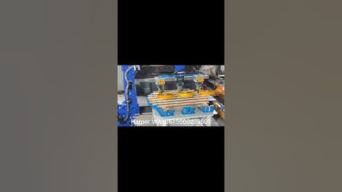 Robotic arm nailing machine process two pallets in thirty seconds