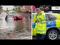 London fire brigade rescues five people from car trapped in floodwater