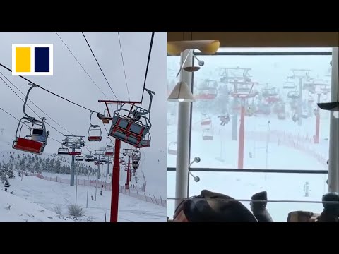Ski lift malfunctions, swings wildly with passengers onboard