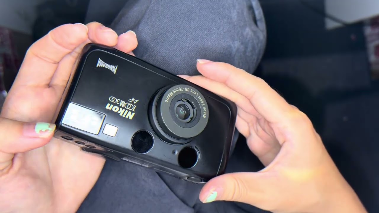 Nikon zoom 300 af - YouTube