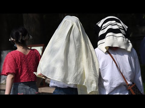 Heat wave sweeps across many parts of China - YouTube