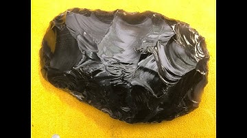 201 - From this to that, flint knapping a black obsidian bi - face. 1/2