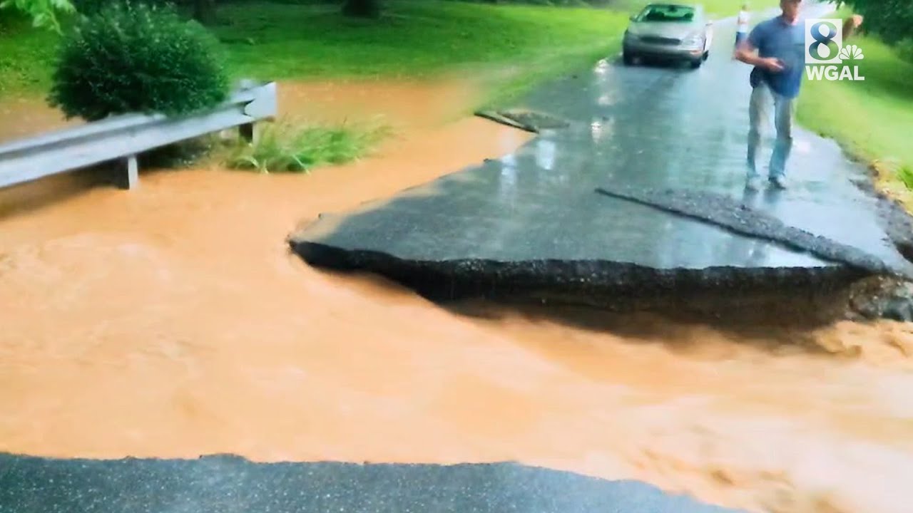 Flash flooding washes out road in Lancaster County - YouTube