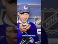 GM Ryan Johnson welcomes Adam Novotný to the Vancouver Canucks.