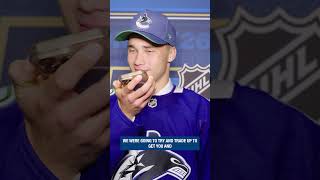GM Ryan Johnson welcomes Adam Novotný to the Vancouver Canucks.