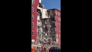 Searches underway following Iowa building collapse