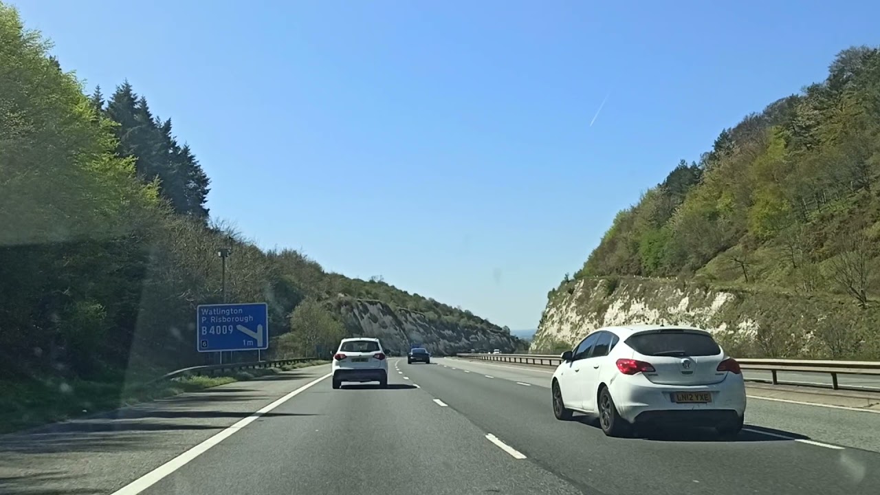 Children chalk escarpment, from A40 westbound, UK, clear skies, 25/04/21