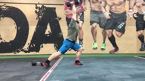 One arm dumbbell split snatch