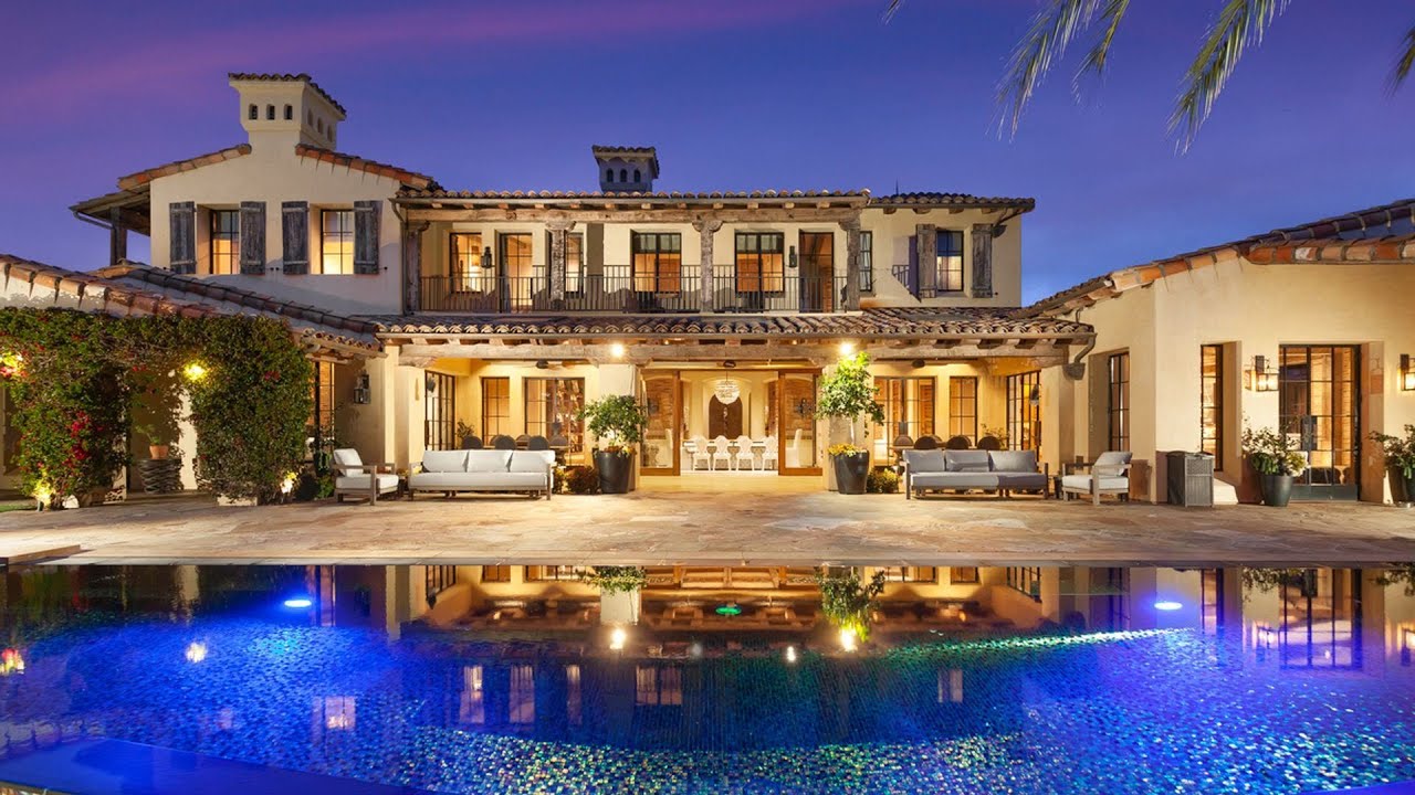 This $15,495,000 BLUE HERON Villa offers exceptional design elements and entertaining amenities