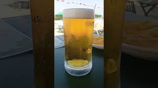 500ml San Miguel and a beach breeze. WiWi Beach coffee and food Da Nang. Tuesday afternoon