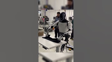 Tesla Optimus Bot FOLDS the Laundry !