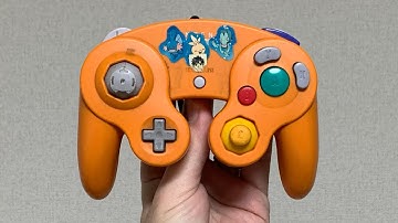 Dirty Nintendo GameCube controller, covered in Pokémon stickers, gets cleaned and joysticks fixed