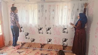 Protecting privacy: installing curtains for Majid's nomadic family