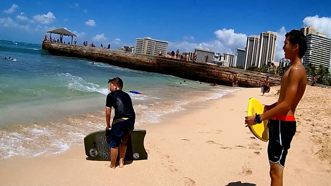 video phone beyonce mp3 Queens Beach, at Waikiki Beach, Great Boogie Boarding Body Surfing Beach, Honolulu, Hawaii