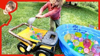 Dump Trucks Hauling Water Beads