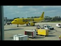 Simultaneous spirit A320s arriving at the gates at Orlando international airport