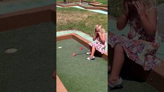 Little girl tries to golf 🥺 I asked her if she wanted help! #golfing #minigolf #cute