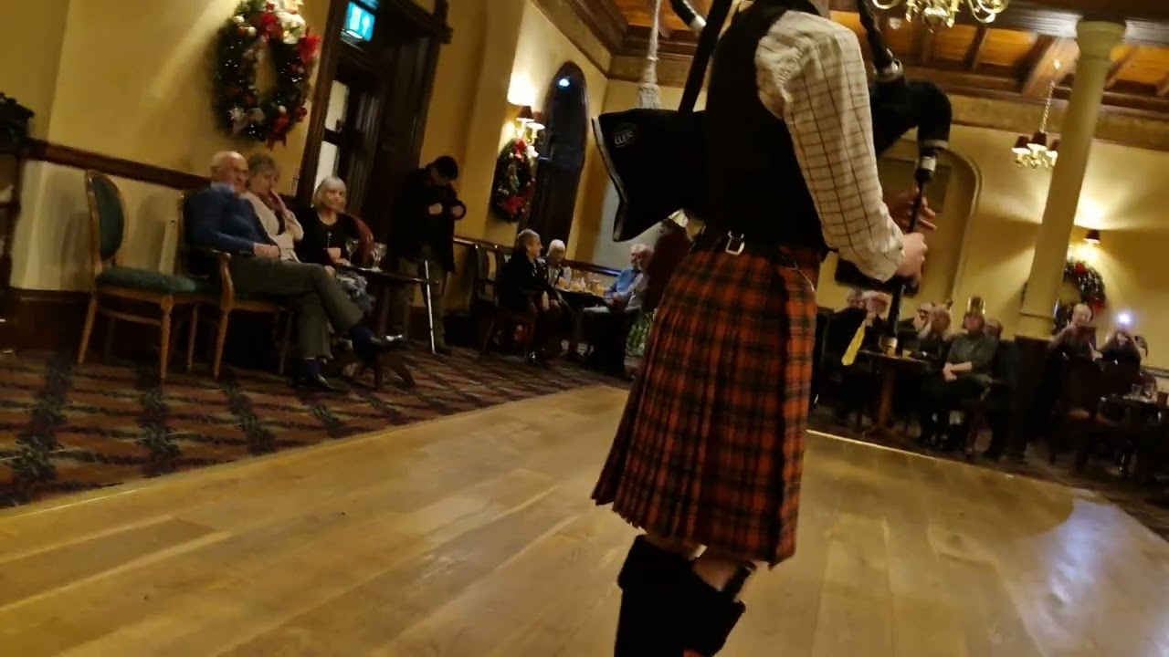 Young bagpipes player at Loch Awe Hotel. 24th November 2025