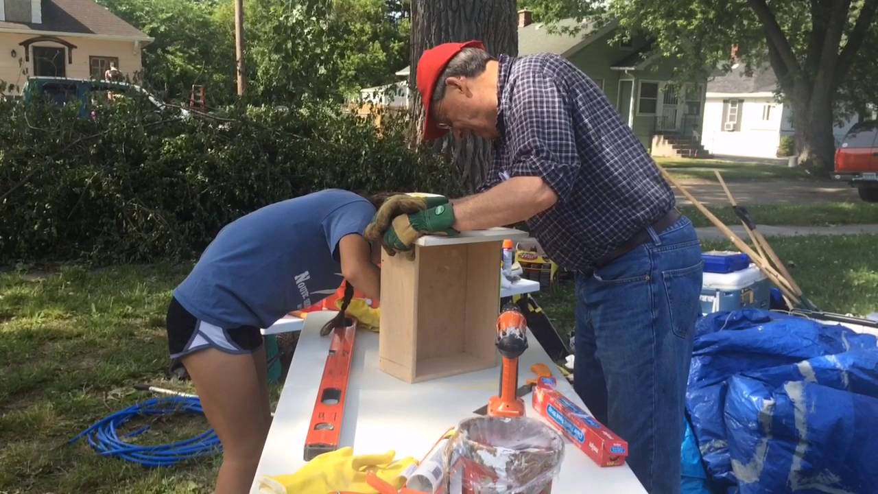 One Week, One Street volunteers fix up Saginaw homes