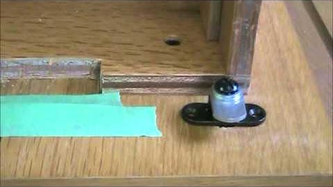 Install a simple 2 wing lock on a wood filing cabinet