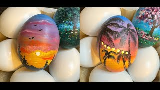 Easter painting of the sunset mountain view and coconut trees on one egg.