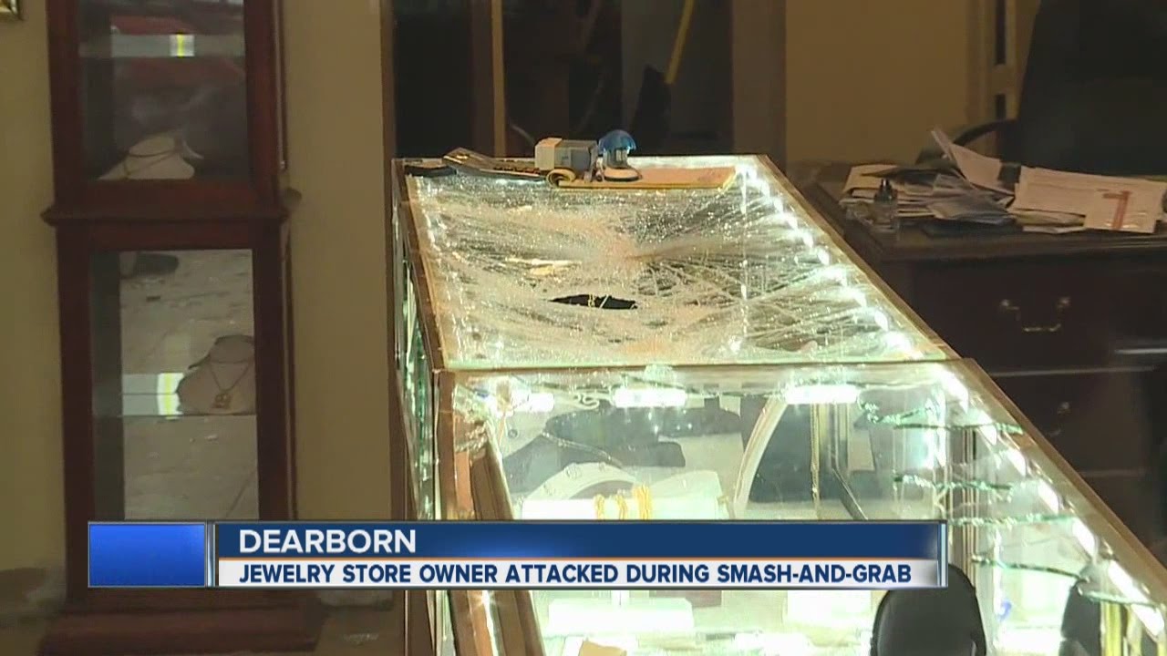 Jewelry store owner attacked during smash and grab - YouTube