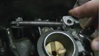 How a Briggs and Stratton Push Mower engine governor/throttle linkage is set up, and how it works.